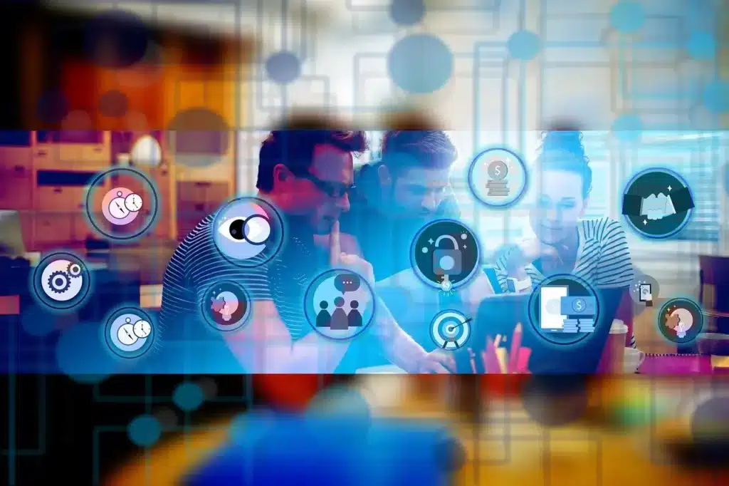 Three focused individuals collaborate around a laptop, overlaid with abstract glowing icons representing interconnected digital concepts such as security, data analysis, communication, and financial growth, suggesting a brainstorming session on online business strategy and digital solutions.