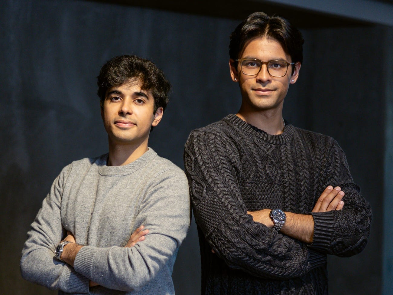 Rohan Vasishth and Faraz Siddiqi, co-founders of the AI startup Bluejay, in a professional portrait with their arms crossed.